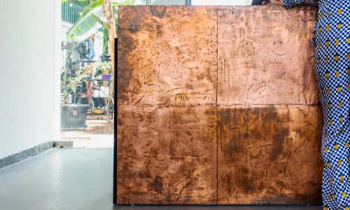 Raw-Copper-and-pine-wood-Reception-Desk_02_NMBello-Studio_Olajide-Ayeni